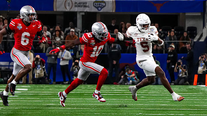 Texas Longhorns receiver Ryan Wingo (5) runs the ball during the College Football Playoff semifinal game against Ohio State in the Cotton Bowl at AT&T Stadium on Friday, Jan. 10, 2024 in Arlington, Texas.