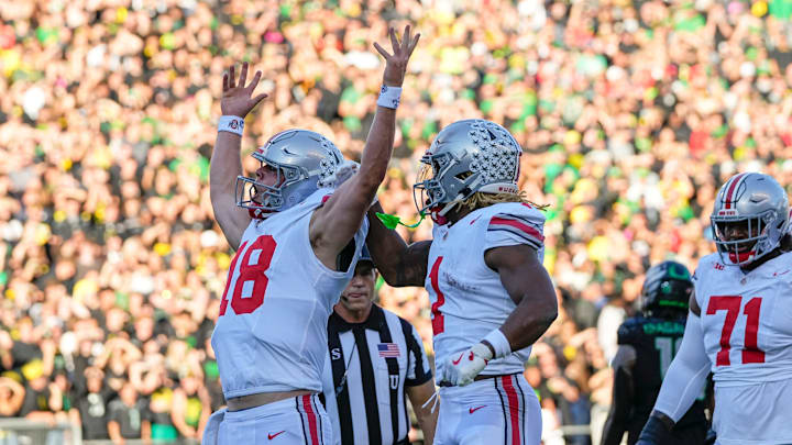 Oct 12, 2024; Eugene, Oregon, USA; Ohio State Buckeyes quarterback Will Howard (18) celebrates scoring a touchdown during the first half of the NCAA football game against the Oregon Ducks at Autzen Stadium
