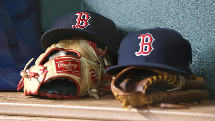 Jun 2, 2018; Houston, TX, USA; General view of Boston Red Sox caps with gloves in the dugout during the game against the Houston Astros at Minute Maid Park. Mandatory Credit: Troy Taormina-Imagn Images Jun 2, 2018; Houston, TX, USA; General view of Boston Red Sox caps with gloves in the dugout during the game against the Houston Astros at Minute Maid Park. Mandatory Credit: Troy Taormina-Imagn Images