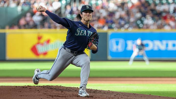 Aug 16, 2026; Houston, Texas, USA;  Seattle Mariners starting pitcher Bryan Woo (22) pitches against the Houston Astros in the first inning at Daikin Park. Mandatory Credit: Thomas Shea-Imagn Images