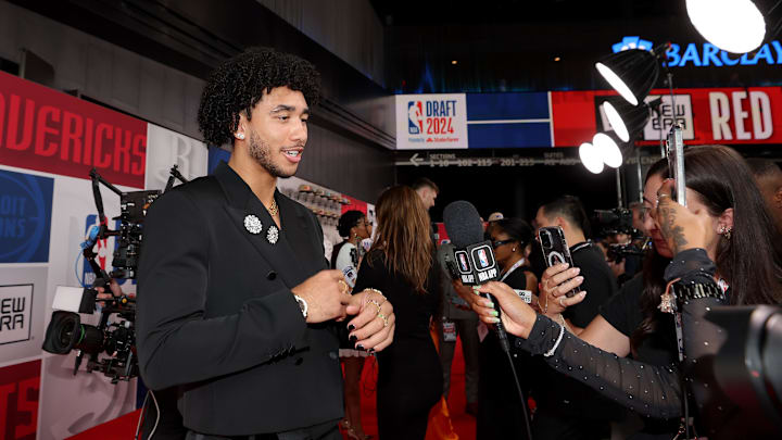 Jun 26, 2024; Brooklyn, NY, USA; Jared McCain is interviewed on the red carpet after arriving for the first round of the 2024 NBA Draft at Barclays Center. Mandatory Credit: Brad Penner-Imagn Images