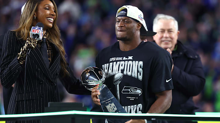 Seattle Seahawks running back Kenneth Walker III (9) celebrates with the Vince Lombardi trophy.