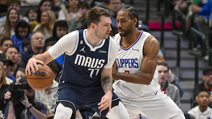 Jan 22, 2023; Dallas, Texas, USA; Dallas Mavericks guard Luka Doncic (77) looks to move the ball