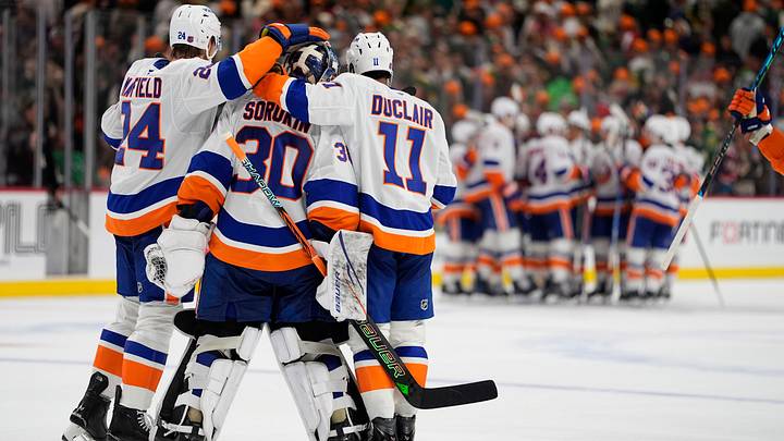 Oct 29, 2026; Saint Paul, Minnesota, USA;  New York Islanders defenseman Scott Mayfield (24) and forward Anthony Duclair (11) celebrate with goalie Ilya Sorokin (30) as the rest of the team surrounds defenseman Matthew Schaefer (48) after his overtime goal defeated the Minnesota Wild at Grand Casino Arena.  Mandatory Credit: Bruce Kluckhohn-Imagn Images