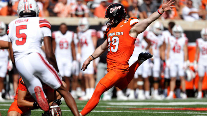 Oklahoma State's Logan Ward (19) kicks a field goal in the first half of the college football between the Oklahoma State University Cowboys and the Utah Utes at Boone Pickens Stadium in Stillwater, Okla., Saturday, Sept., 21, 2024. Oklahoma State's Logan Ward (19) kicks a field goal in the first half of the college football between the Oklahoma State University Cowboys and the Utah Utes at Boone Pickens Stadium in Stillwater, Okla., Saturday, Sept., 21, 2024.