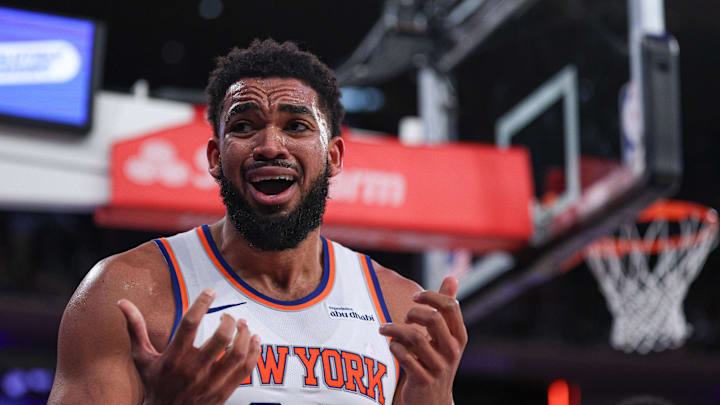 Jan 7, 2026; New York, New York, USA; New York Knicks center Karl-Anthony Towns (32) reacts during the second half against the LA Clippers at Madison Square Garden. Mandatory Credit: Vincent Carchietta-Imagn Images
