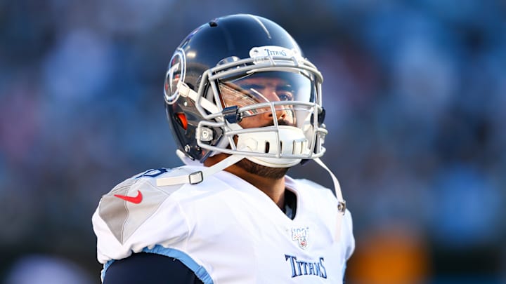 Nov 3, 2019; Charlotte, NC, USA; Tennessee Titans quarterback Marcus Mariota (8) stands on the sidelines during the fourth quarter against the Carolina Panthers at Bank of America Stadium. Mandatory Credit: Jeremy Brevard-Imagn Images