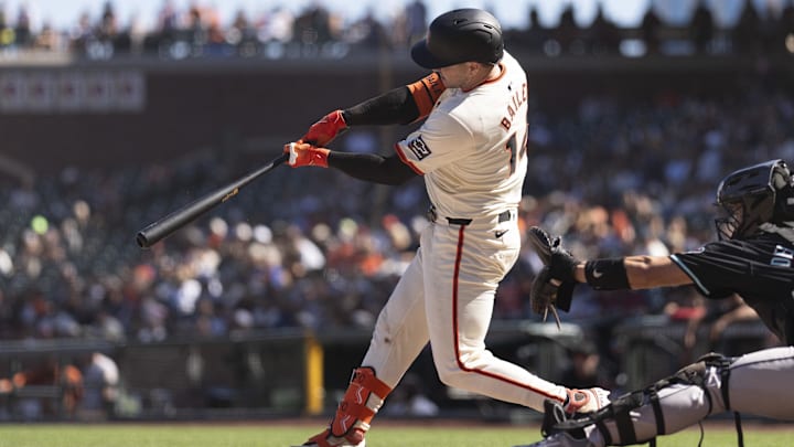 Sep 5, 2024; San Francisco, California, USA;  San Francisco Giants catcher Patrick Bailey (14) hits a walk off double to win the game against the Arizona Diamondbacks at Oracle Park.