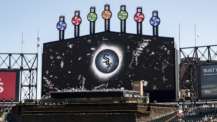 Apr 13, 2024; Chicago, Illinois, USA; The scoreboard is seen showing the total solar eclipse on it prior to a game between the Chicago White Sox and the Cincinnati Reds at Guaranteed Rate Field. Mandatory Credit: Patrick Gorski-Imagn Images