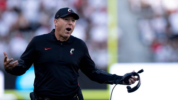 Cincinnati Bearcats head coach Scott Satterfield speaks to the referees in the fourth quarter of the NCAA football game between the Cincinnati Bearcats and Bowling Green Falcons at Nippert Stadium in Cincinnati on Sept. 6, 2025.