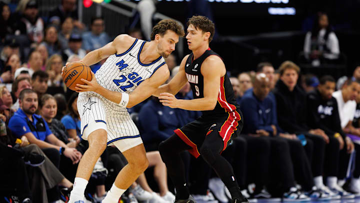 Oct 12, 2025; Orlando, Florida, USA; Miami Heat guard Pelle Larsson (9) defends Orlando Magic forward Franz Wagner (22) during the first half at Kia Center. Mandatory Credit: Matt Pendleton-Imagn Images Oct 12, 2025; Orlando, Florida, USA; Miami Heat guard Pelle Larsson (9) defends Orlando Magic forward Franz Wagner (22) during the first half at Kia Center. Mandatory Credit: Matt Pendleton-Imagn Images