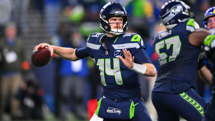 Jan 25, 2026; Seattle, WA, USA; Seattle Seahawks quarterback Sam Darnold (14) passes against the Los Angeles Rams during the second half in the 2026 NFC Championship Game at Lumen Field. Mandatory Credit: Steven Bisig-Imagn Images