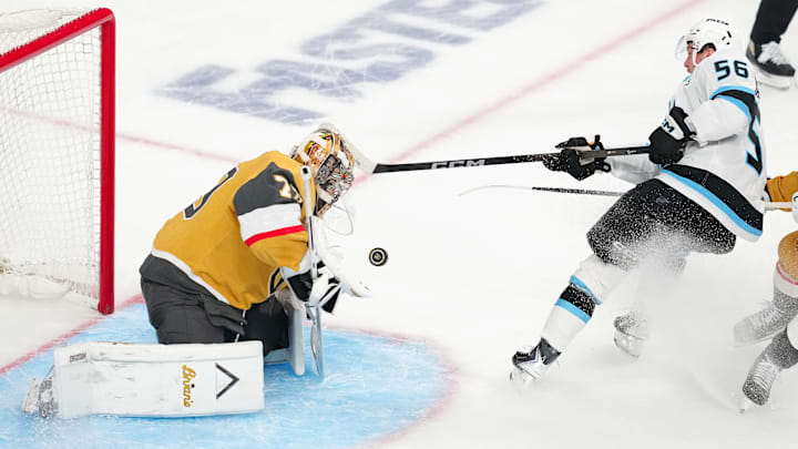Apr 21, 2026; Las Vegas, Nevada, USA; Vegas Golden Knights goaltender Carter Hart (79) makes a save against Utah Mammoth right wing Kailer Yamamoto (56) during the third period of game two of the first round of the 2026 Stanley Cup Playoffs at T-Mobile Arena. Mandatory Credit: Stephen R. Sylvanie-Imagn Images