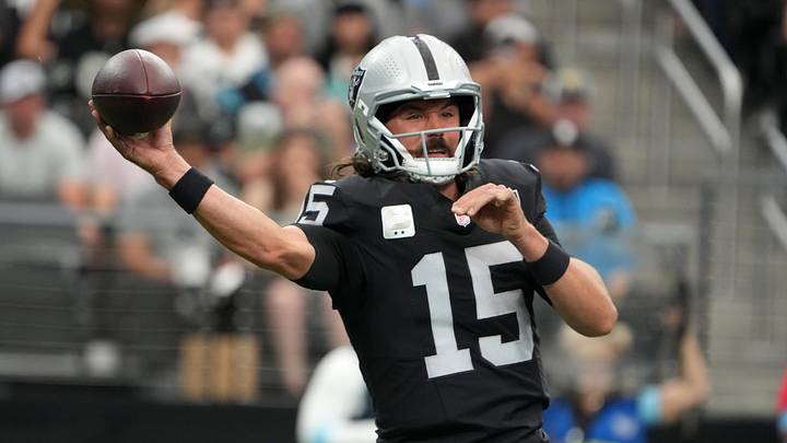 Sep 22, 2024; Paradise, Nevada, USA; Las Vegas Raiders quarterback Gardner Minshew (15) throws the ball against the Carolina Panthers in the first half at Allegiant Stadium. Mandatory Credit: Kirby Lee-Imagn Images