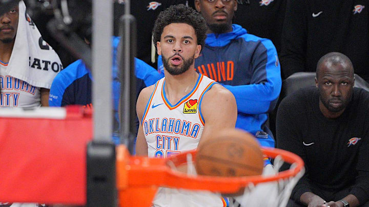 May 24, 2025; Minneapolis, Minnesota, USA; Oklahoma City Thunder guard Ajay Mitchell (25) makes a three point basket against the Minnesota Timberwolves during the second half in game three of the western conference finals for the 2025 NBA Playoffs at Target Center. May 24, 2025; Minneapolis, Minnesota, USA; Oklahoma City Thunder guard Ajay Mitchell (25) makes a three point basket against the Minnesota Timberwolves during the second half in game three of the western conference finals for the 2025 NBA Playoffs at Target Center.