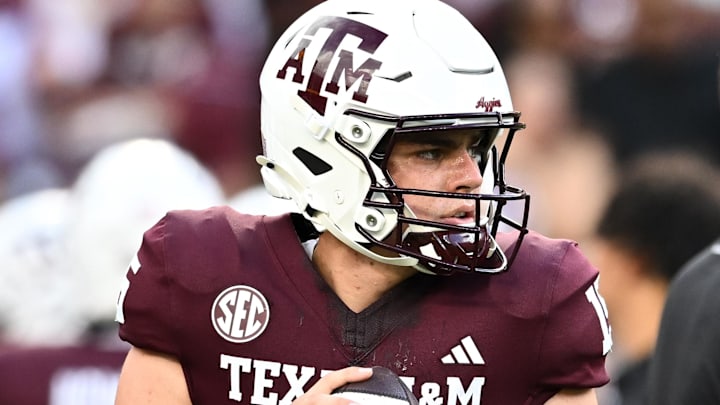 Aug 31, 2024; College Station, Texas, USA; Texas A&M Aggies quarterback Conner Weigman (15) warms up prior to the game against the Notre Dame Fighting Irish at Kyle Field. Mandatory Credit: Maria Lysaker-Imagn Images