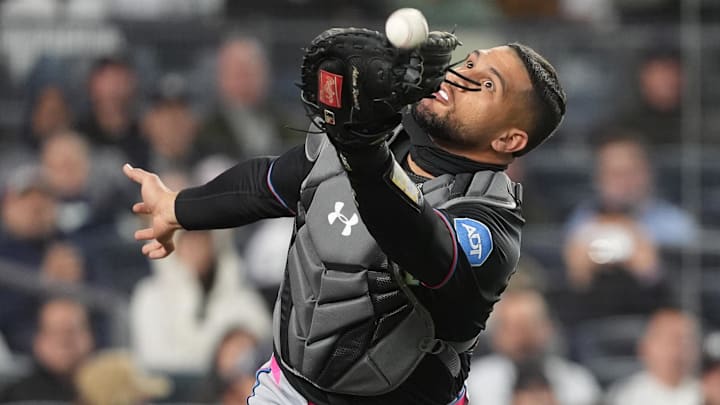 Miami Marlins catcher Agustin Ramirez (50) catches a foul ball. 