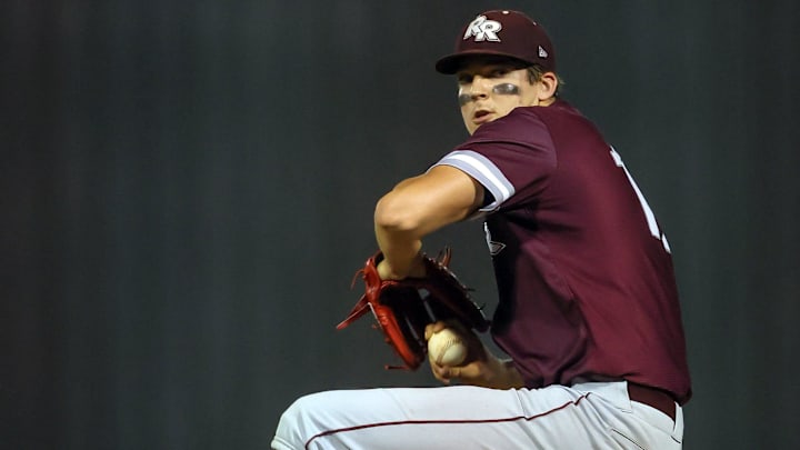Round Rock senior star Travis Sykora sets his pitch against Vista Ridge in a District 25-6A opener March 7, 2023, at Round Rock High School. Sykora and the Dragons blanked Vista Ridge on the scoreboard, taking a 9-0 victory. Round Rock senior star Travis Sykora sets his pitch against Vista Ridge in a District 25-6A opener March 7, 2023, at Round Rock High School. Sykora and the Dragons blanked Vista Ridge on the scoreboard, taking a 9-0 victory.