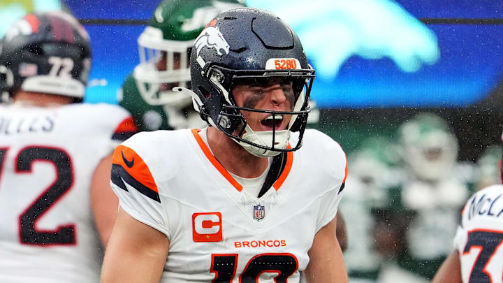 Sep 29, 2024; East Rutherford, New Jersey, USA;  Denver Broncos quarterback Bo Nix (10) celebrates the win over against the New York Jets at MetLife Stadium. Mandatory Credit: Robert Deutsch-Imagn Images