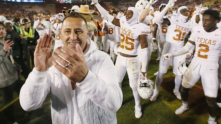 Texas Longhorns football head coach Steve Sarkisian celebrates with the team after winning 26-16 over Iowa State in the Big-12 football at Jack Trice Stadium on Saturday, Nov. 18, 2023, in Ames, Iowa