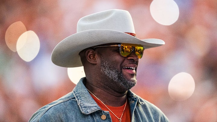 Former Texas quarterback Vince Young takes the field during a timeout in the fourth quarter of the Texas Longhorns' game against the Kentucky Wildcats at Darrell K Royal Texas Memorial Stadium in Austin, Nov. 23, 2024. Former Texas quarterback Vince Young takes the field during a timeout in the fourth quarter of the Texas Longhorns' game against the Kentucky Wildcats at Darrell K Royal Texas Memorial Stadium in Austin, Nov. 23, 2024.