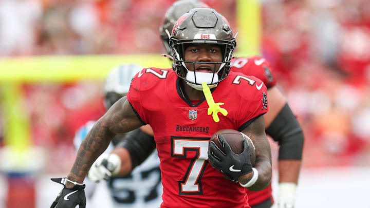 Dec 29, 2024; Tampa, Florida, USA; Tampa Bay Buccaneers running back Bucky Irving (7) runs with the ball against the Carolina Panthers in the second quarter at Raymond James Stadium. Mandatory Credit: Nathan Ray Seebeck-Imagn Images Dec 29, 2024; Tampa, Florida, USA; Tampa Bay Buccaneers running back Bucky Irving (7) runs with the ball against the Carolina Panthers in the second quarter at Raymond James Stadium. Mandatory Credit: Nathan Ray Seebeck-Imagn Images