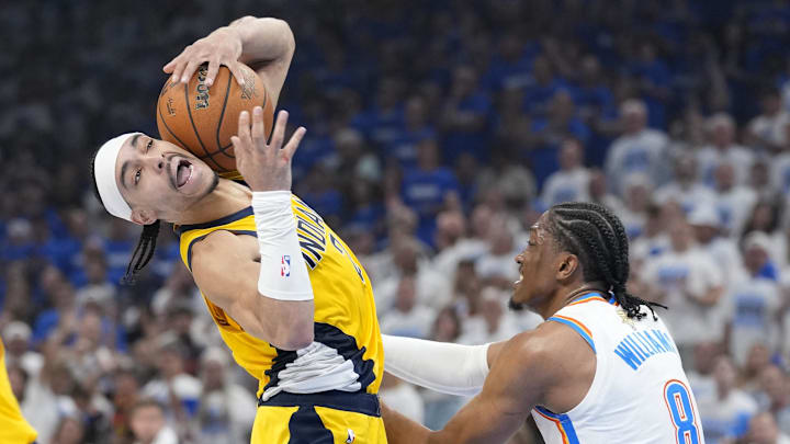 Jun 16, 2025; Oklahoma City, Oklahoma, USA; Indiana Pacers guard Andrew Nembhard (2) in action against Oklahoma City Thunder forward Jalen Williams (8) during the second quarter of game five of the 2025 NBA Finals at Paycom Center. Mandatory Credit: Kyle Terada-Imagn Images