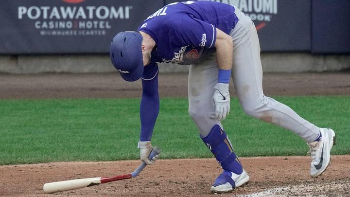 Los Angeles Dodgers right fielder Kyle Tucker (23) breaks his bat after flying out with two runners win base during the ninth inning of their game Sunday, May 24, 2026 at American Family Field in Milwaukee, Wisconsin.