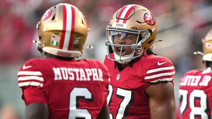 Oct 19, 2025; Santa Clara, California, USA; San Francisco 49ers safety Ji'Ayir Brown (center right) talks with safety Malik Mustapha (6) during the second quarter against the Atlanta Falcons at Levi's Stadium. Mandatory Credit: Darren Yamashita-Imagn Images