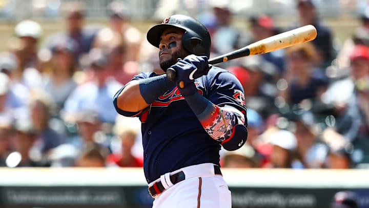 Aug 21, 2019; Minneapolis, MN, USA; Minnesota Twins designated hitter Nelson Cruz (23) hits a base hit in the fourth inning against the Chicago White Sox at Target Field.