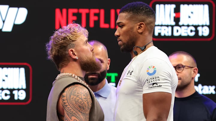 Jake Paul and Anthony Joshua face off after a press conference announcing their heavyweight boxing match at Kayesa Center. Jake Paul and Anthony Joshua face off after a press conference announcing their heavyweight boxing match at Kayesa Center.