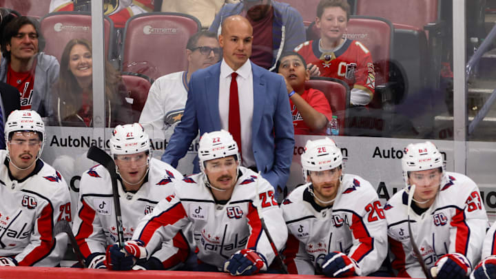 Nov 25, 2024; Sunrise, Florida, USA; Washington Capitals head coach Spencer Carbery watches from the bench against the Florida Panthers during the third period at Amerant Bank Arena. Mandatory Credit: Sam Navarro-Imagn Images