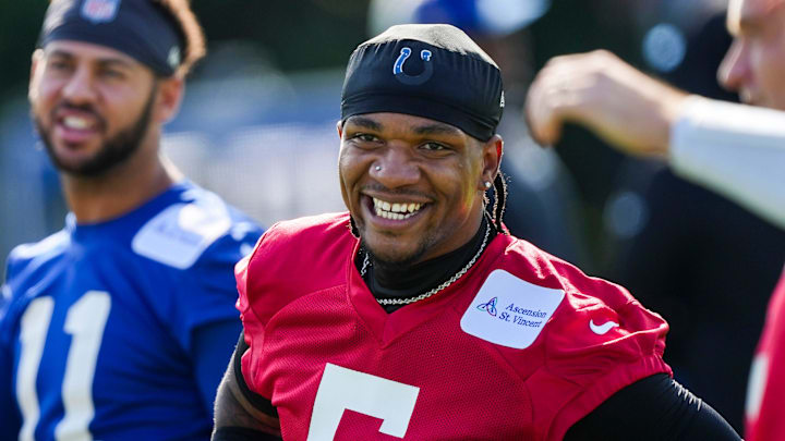 Indianapolis Colts quarterback Anthony Richardson (5) smiles while warming up Saturday, July 27, 2024, during the Indianapolis Colts’ training camp at Grand Park Sports Complex in Westfield.