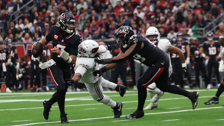 Dec 14, 2025; Houston, Texas, USA; Houston Texans quarterback C.J. Stroud (7) runs for a gain past Arizona Cardinals defensive tackle Walter Nolen III (97) during the third quarter at NRG Stadium. Mandatory Credit: Thomas Shea-Imagn Images Dec 14, 2025; Houston, Texas, USA; Houston Texans quarterback C.J. Stroud (7) runs for a gain past Arizona Cardinals defensive tackle Walter Nolen III (97) during the third quarter at NRG Stadium. Mandatory Credit: Thomas Shea-Imagn Images