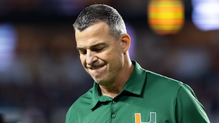 Jan 19, 2026; Miami Gardens, FL, USA; Miami Hurricanes head coach Mario Cristobal reacts against the Indiana Hoosiers during the College Football Playoff National Championship game at Hard Rock Stadium. Mandatory Credit: Mark J. Rebilas-Imagn Images