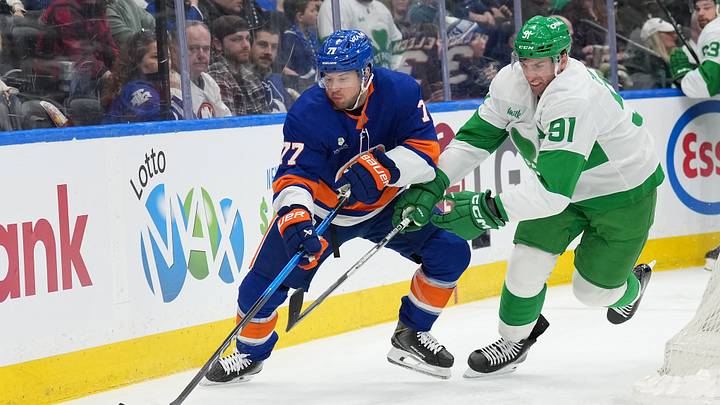 Mar 17, 2026; Toronto, Ontario, CAN; Toronto Maple Leafs center John Tavares (91) battles for the puck with New York Islanders defenseman Tony DeAngelo (77) during the first period at Scotiabank Arena. Mandatory Credit: Nick Turchiaro-Imagn Images Mar 17, 2026; Toronto, Ontario, CAN; Toronto Maple Leafs center John Tavares (91) battles for the puck with New York Islanders defenseman Tony DeAngelo (77) during the first period at Scotiabank Arena. Mandatory Credit: Nick Turchiaro-Imagn Images