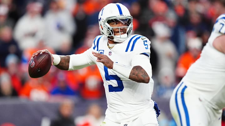 Dec 15, 2024; Denver, Colorado, USA; Indianapolis Colts quarterback Anthony Richardson (5) prepares to pass the ball in the second half against the Denver Broncos at Empower Field at Mile High.