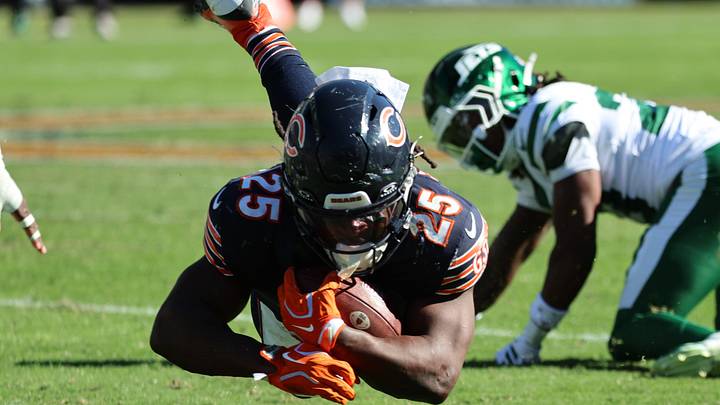 Chicago Bears running back Kyle Monangai (25) gets tripped up on a run against the New York Jets during the second half at Soldier Field. Mandatory Credit: Mike Dinovo-Imagn Images Chicago Bears running back Kyle Monangai (25) gets tripped up on a run against the New York Jets during the second half at Soldier Field. Mandatory Credit: Mike Dinovo-Imagn Images