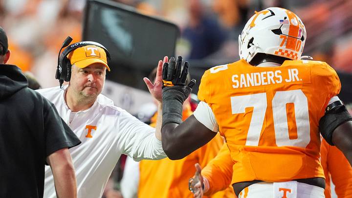 Tennessee coach Josh Heupel high-fives Tennessee offensive lineman David Sanders Jr. (70) during a football game between Tennessee and Alabama at Neyland Stadium in Knoxville, Tenn., on Oct. 17, 2026. Tennessee coach Josh Heupel high-fives Tennessee offensive lineman David Sanders Jr. (70) during a football game between Tennessee and Alabama at Neyland Stadium in Knoxville, Tenn., on Oct. 17, 2026.