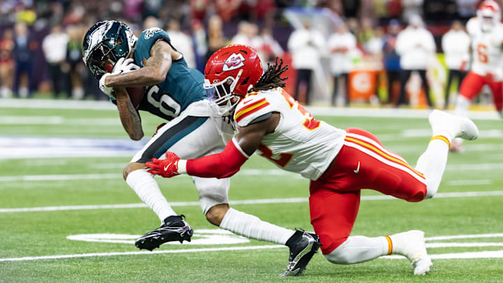 Feb 9, 2025; New Orleans, LA, USA; Philadelphia Eagles wide receiver DeVonta Smith (6) is tackled by Kansas City Chiefs linebacker Nick Bolton (32) during Super Bowl LIX at Ceasars Superdome. Mandatory Credit: Mark J. Rebilas-Imagn Images Feb 9, 2025; New Orleans, LA, USA; Philadelphia Eagles wide receiver DeVonta Smith (6) is tackled by Kansas City Chiefs linebacker Nick Bolton (32) during Super Bowl LIX at Ceasars Superdome. Mandatory Credit: Mark J. Rebilas-Imagn Images