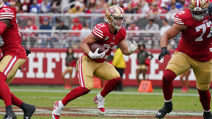 Nov 17, 2024; Santa Clara, California, USA; San Francisco 49ers running back Christian McCaffrey (23) rushes the ball against the Seattle Seahawks in the second quarter at Levi's Stadium. Mandatory Credit: David Gonzales-Imagn Images