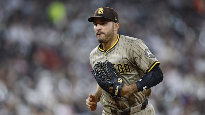 Sep 19, 2025; Chicago, Illinois, USA; San Diego Padres left fielder Ramon Laureano (5) returns to the dugout after the seventh inning of a baseball game against the Chicago White Sox at Rate Field. Mandatory Credit: Kamil Krzaczynski-Imagn Images