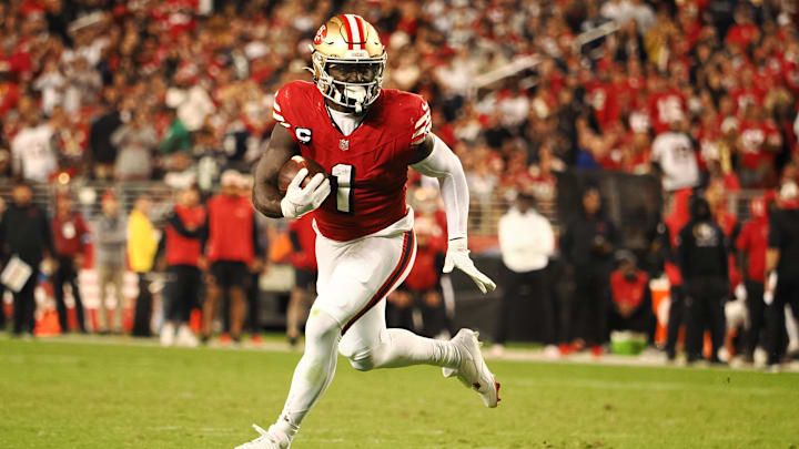 Oct 27, 2024; Santa Clara, California, USA; San Francisco 49ers wide receiver Deebo Samuel Sr (1) carries the ball against the Dallas Cowboys during the third quarter at Levi's Stadium. Mandatory Credit: Kelley L Cox-Imagn Images