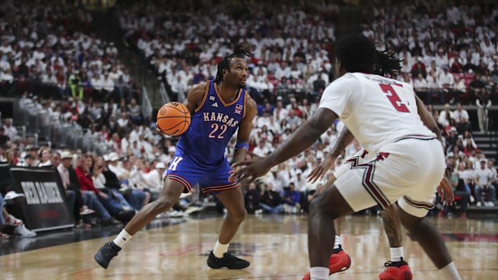 Feb 2, 2026; Lubbock, Texas, USA; Kansas Jayhawks guard Darryn Peterson (22) dribbles the ball against Texas Tech Red Raiders guard Jazz Henderson (2) in the second half at United Supermarkets Arena. Mandatory Credit: Michael C. Johnson-Imagn Images Feb 2, 2026; Lubbock, Texas, USA; Kansas Jayhawks guard Darryn Peterson (22) dribbles the ball against Texas Tech Red Raiders guard Jazz Henderson (2) in the second half at United Supermarkets Arena. Mandatory Credit: Michael C. Johnson-Imagn Images
