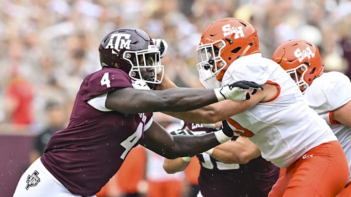 Texas A&M Aggies defensive lineman Shemar Stewart (4) and Sam Houston State Bearkats offensive lineman Jordan Boatman (70) in action during the fourth quarter at Kyle Field. 