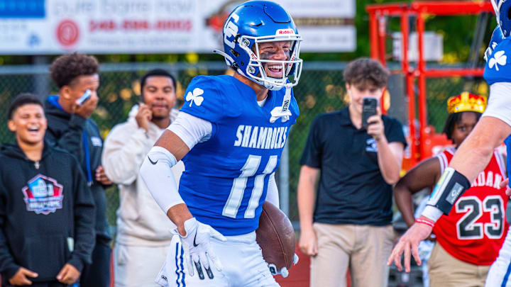 Detroit Catholic Central's Gideon Gash celebrates a touchdown during a football game on Friday, Aug. 29, 2025.