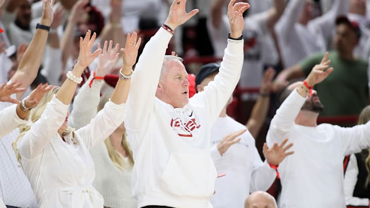 Nov 29, 2023; Fayetteville, Arkansas, USA; Arkansas Razorbacks athletic director Hunter Yurachek calls the hogs during the seance half against the Duke Blue Devils at Bud Walton Arena. Arkansas won 80-75. Mandatory Credit: Nelson Chenault-Imagn Images
