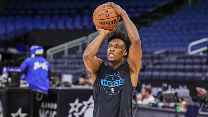 Dec 26, 2025; Orlando, Florida, USA; Charlotte Hornets guard Collin Sexton (8) warms up before the game against the Orlando Magic at Kia Center. Mandatory Credit: Mike Watters-Imagn Images