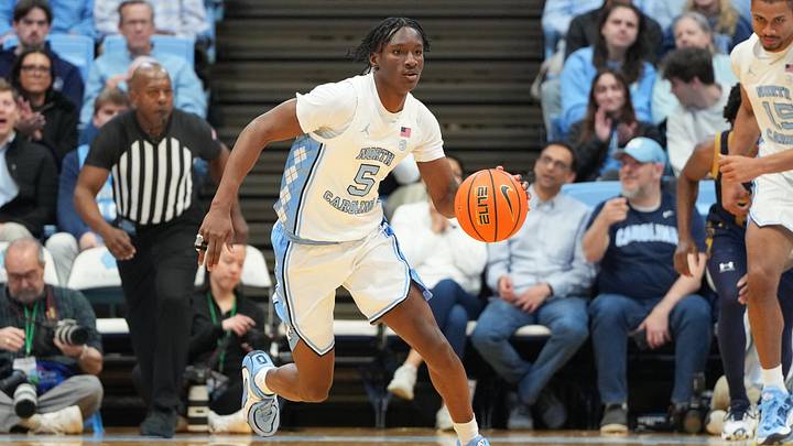 Jan 21, 2026; Chapel Hill, North Carolina, USA; North Carolina Tar Heels guard Isaiah Denis (5) with the ball in the second half at Dean E. Smith Center. Mandatory Credit: Bob Donnan-Imagn Images Jan 21, 2026; Chapel Hill, North Carolina, USA; North Carolina Tar Heels guard Isaiah Denis (5) with the ball in the second half at Dean E. Smith Center. Mandatory Credit: Bob Donnan-Imagn Images