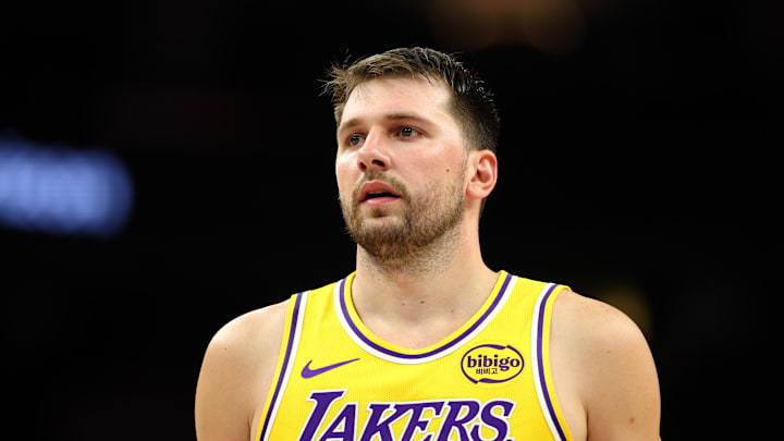 Phoenix, Arizona, USA; Los Angeles Lakers guard Luka Doncic (77) against the Phoenix Suns at Mortgage Matchup Center.